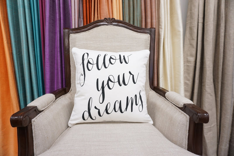 'Follow Your Dreams' Quote Pillow